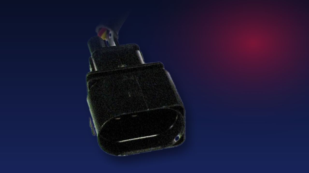 Connecteur électrique de sonde moteur en studio sur fond bleu nuit dégradé avec reflet rouge, Konipa